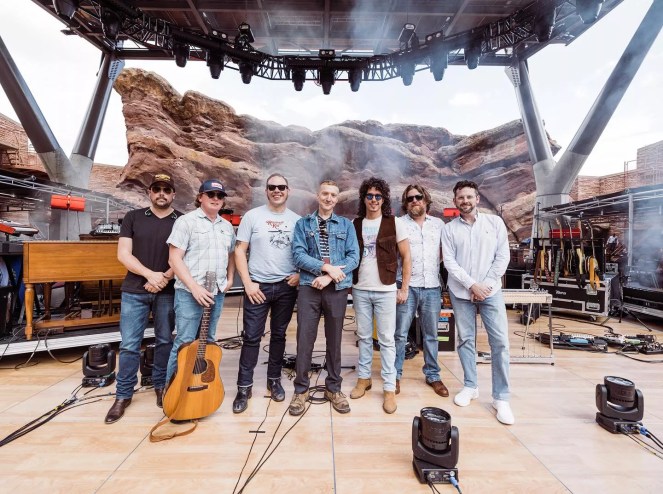 musicians on the stage of red rocks amphitheatre