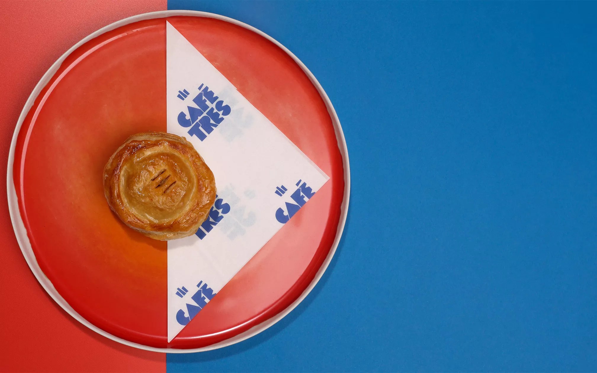 a pastry on a red plate