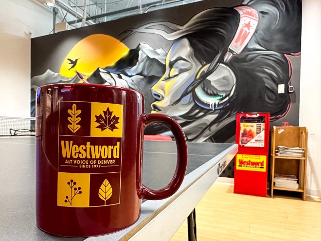 Maroon coffee mug with gold text