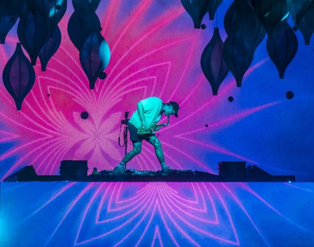 musician against psychedelic background.