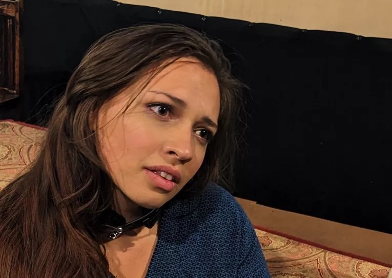 brunette woman gazing to the right