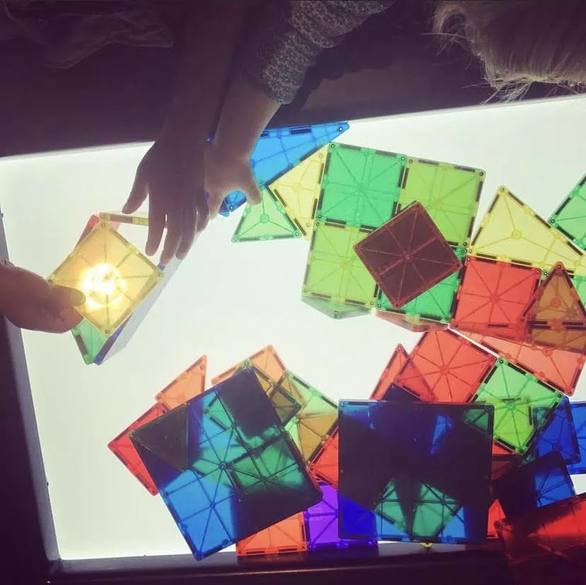 hands playing with glass