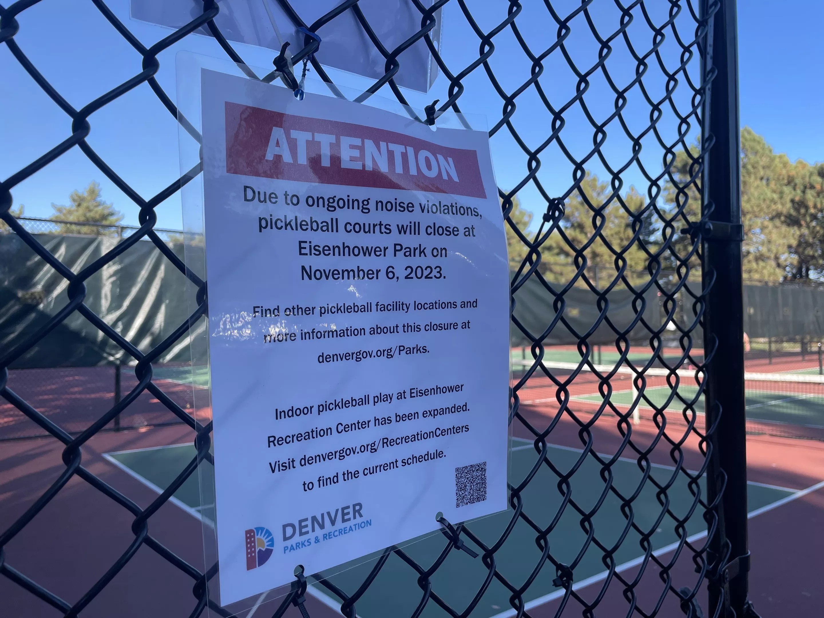A sign at the Eisenhower Pickleball Courts announcing their closure.