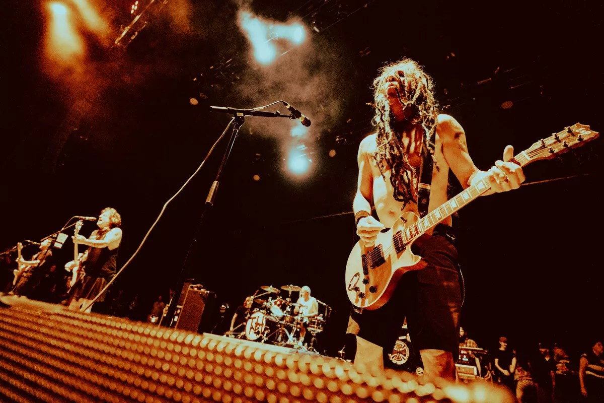 Man playing guitar on stage