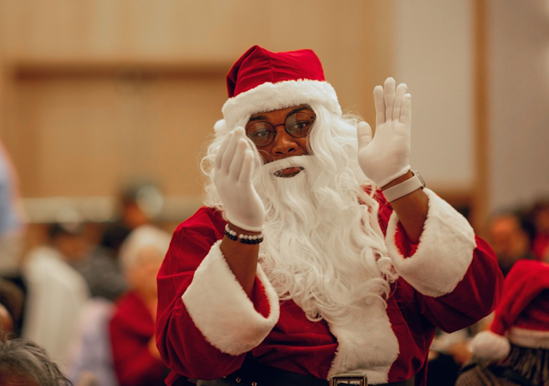 Auon'tai Anderson dressed up as Santa Claus during the Hiawatha Davis Jr. luncheon.
