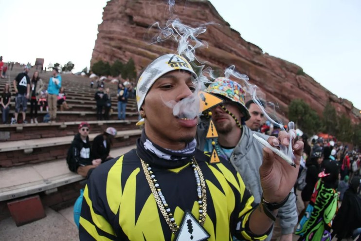 Man smokes weed at Red Rocks in Denver
