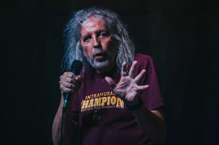 white guy with long grey hair