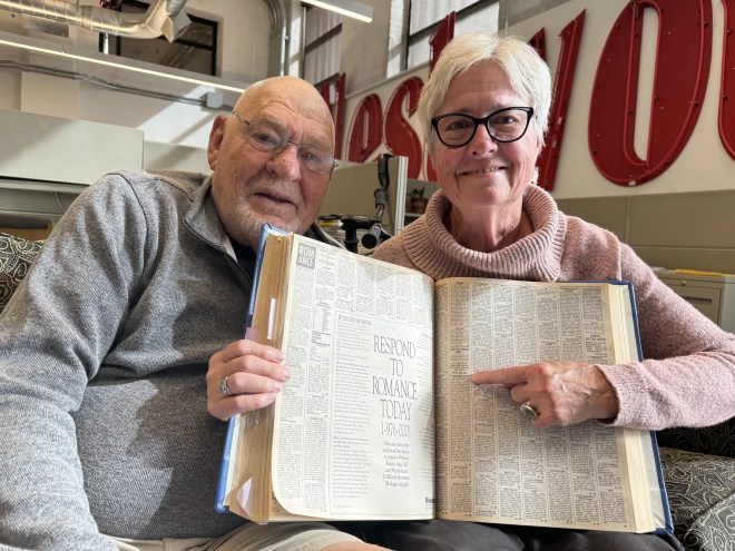 Margerie Hicks and Doug Schuler show off the Westword ad that brought them together over thirty years ago.