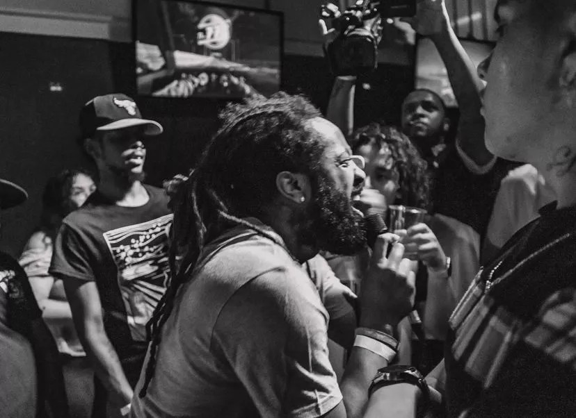 rapper at an open mic