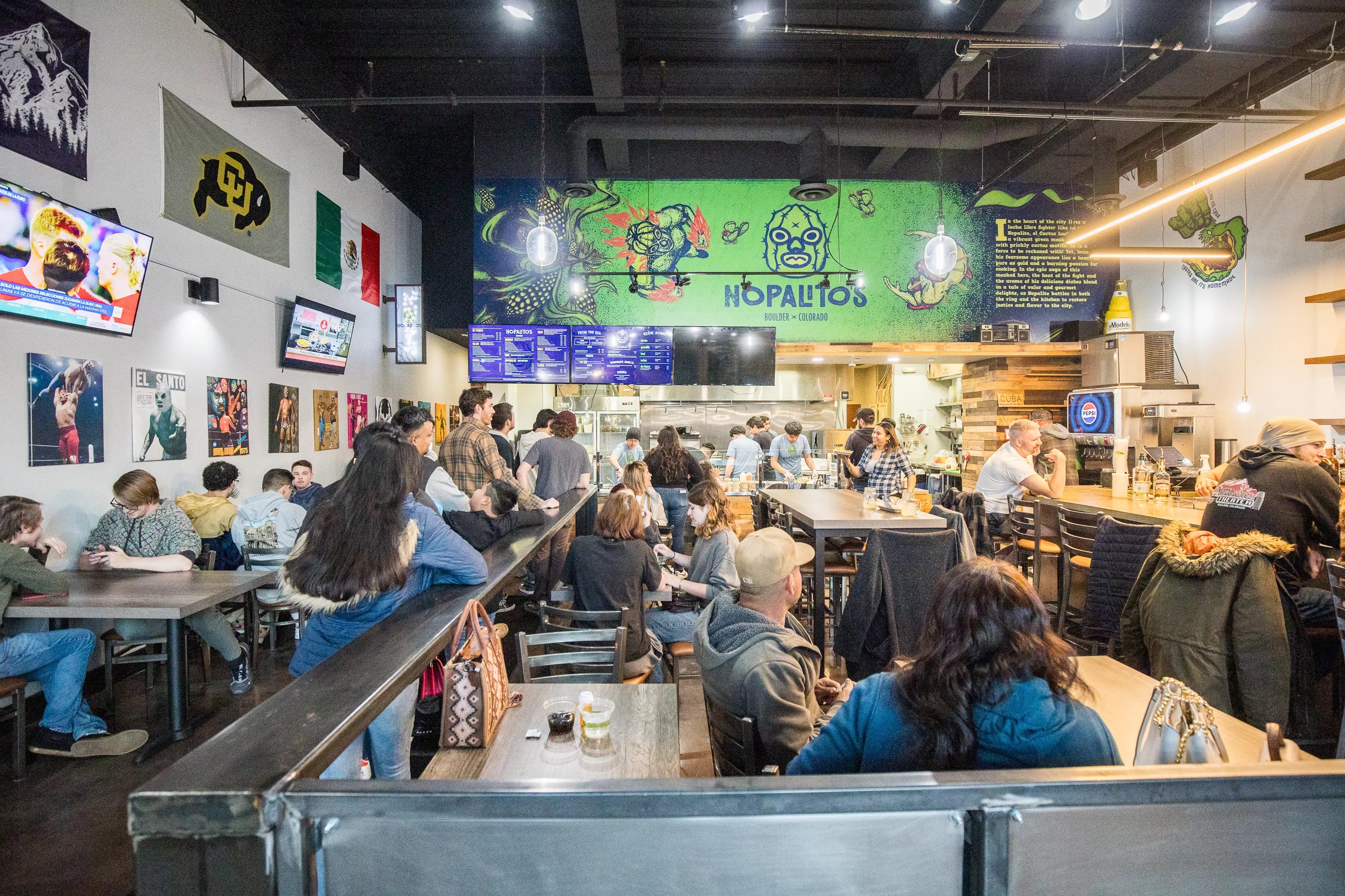 interior of a fast-casual restaurant filled with people