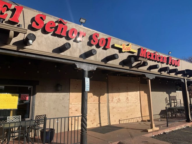 boarded up Mexican restaurant