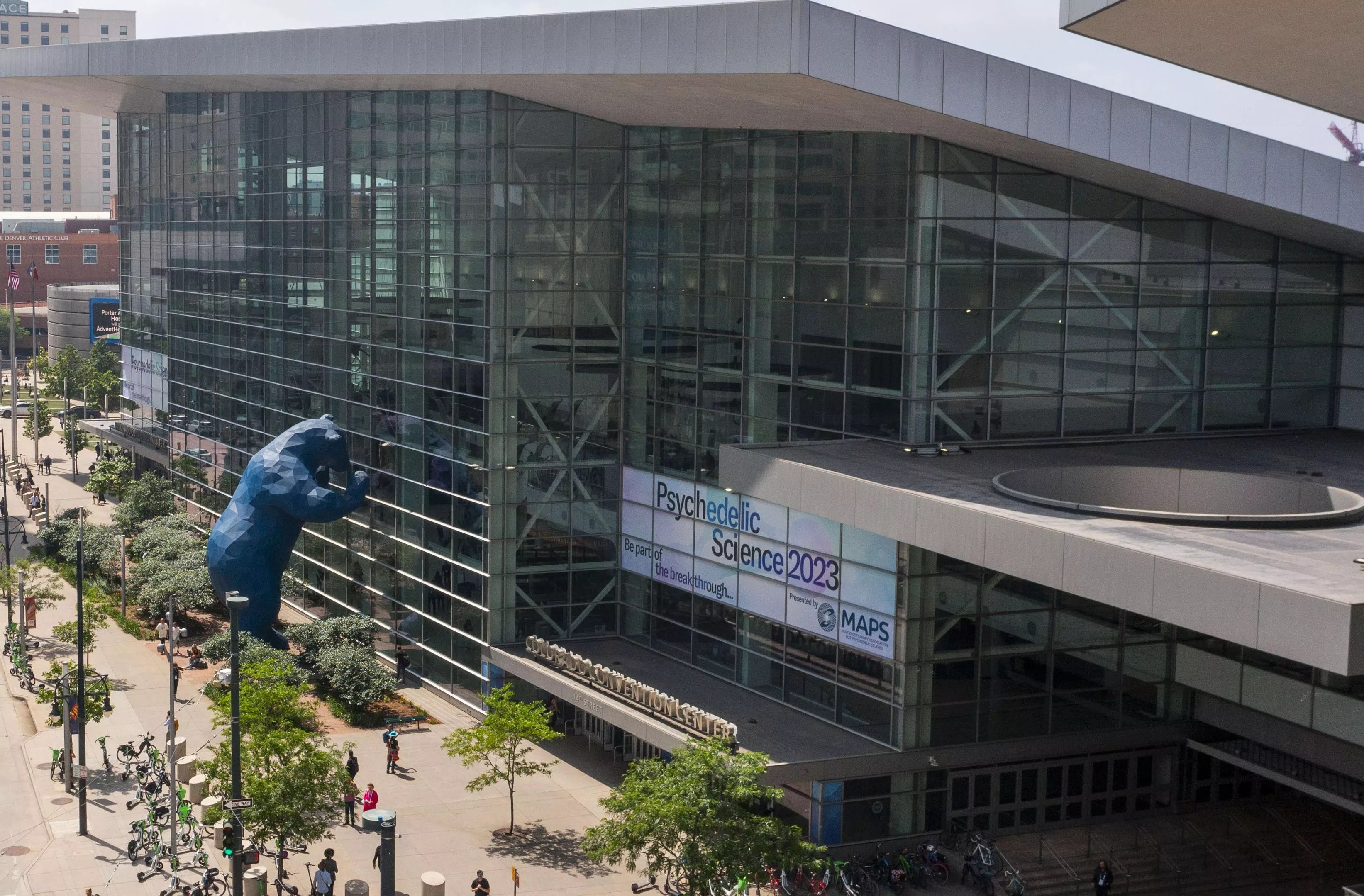 Psychedelic Science 2023 convention at the Colorado Convention Center, with blue bear out front