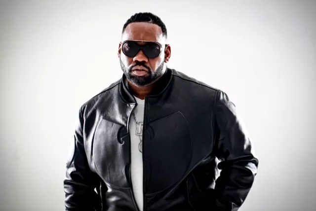 rapper in sunglasses and leather jacket