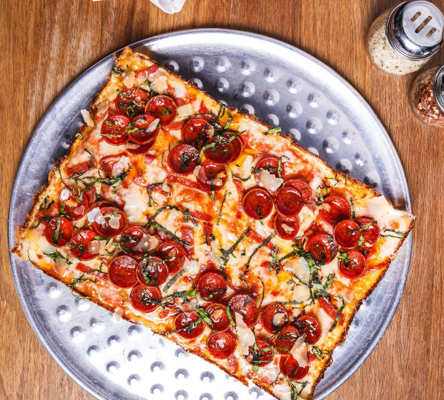 a rectangular pizza topped with pepperoni