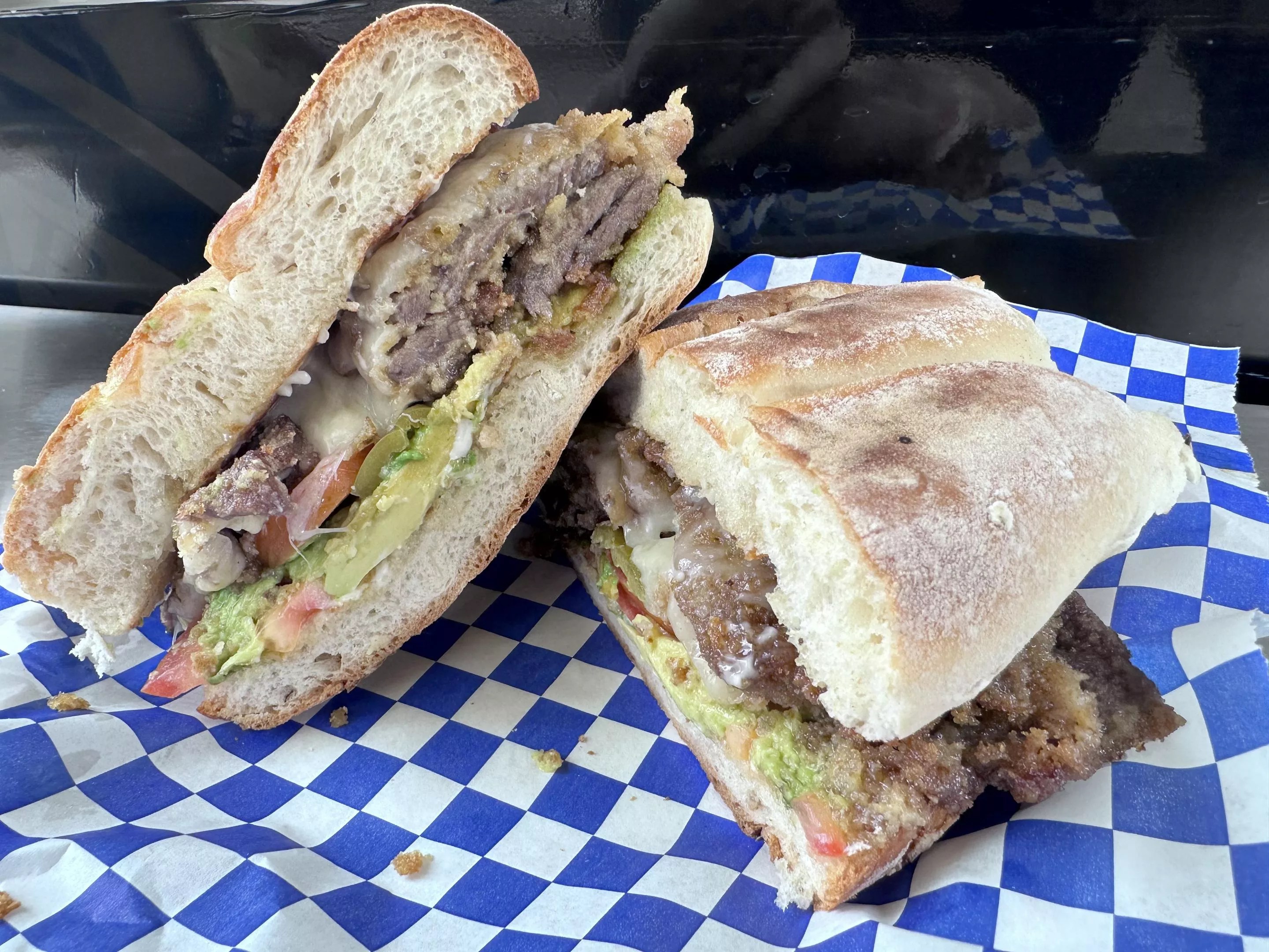 a torta sandwich with breaded steak