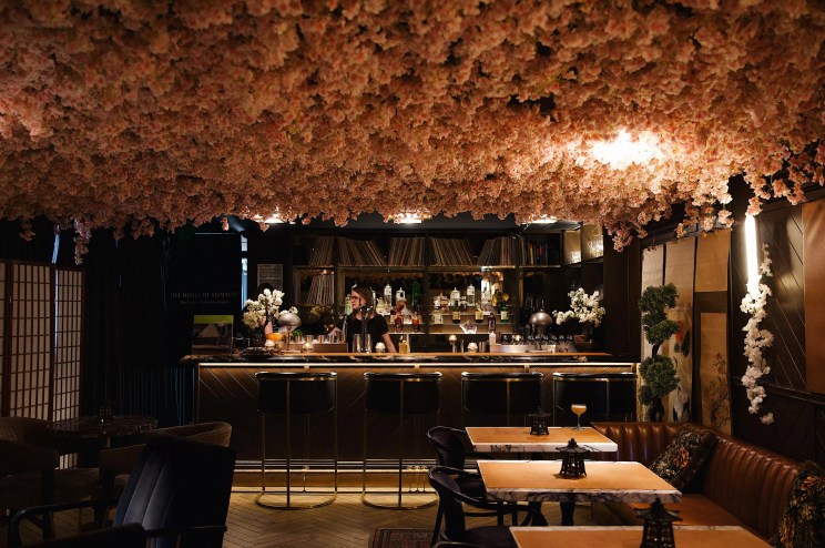 Cherry blossoms affixed to the ceiling of a bar