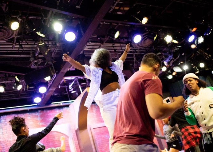 people on stage dancing