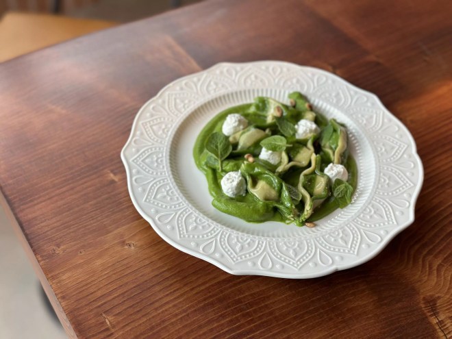 stuffed pasta in a green sauce