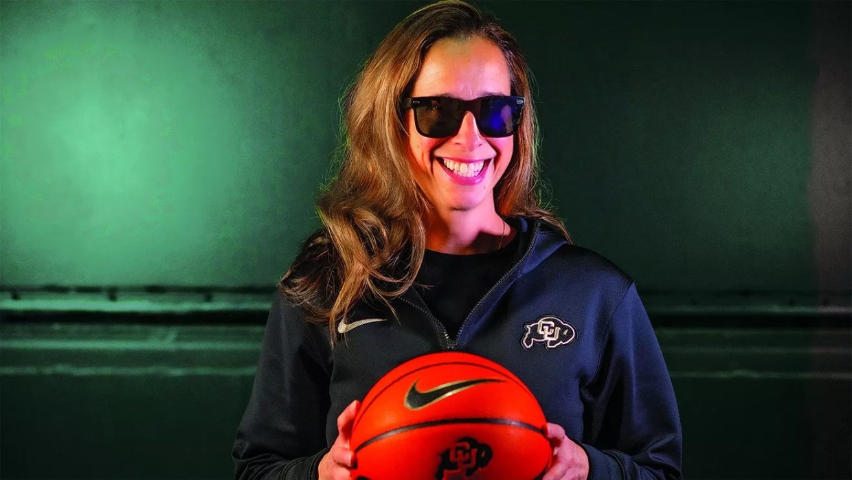 woman in sunglasses with basketball