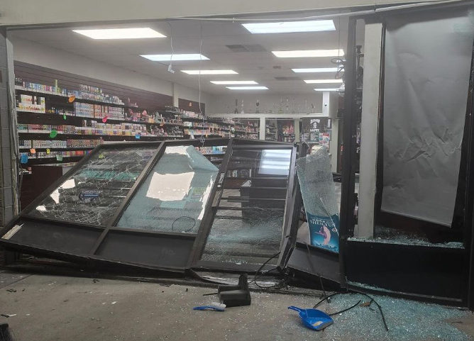 broken windows in front of a store