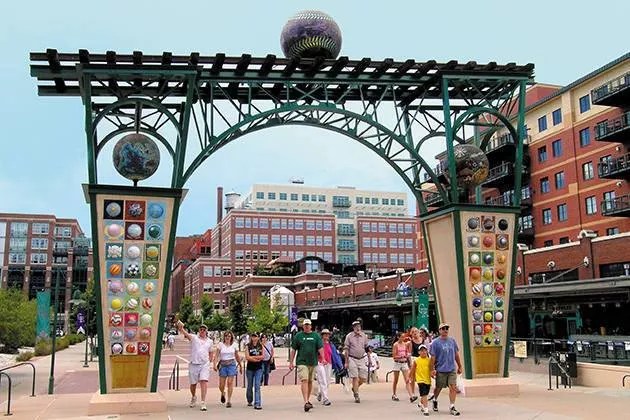 sculpture outside ballpark with fans