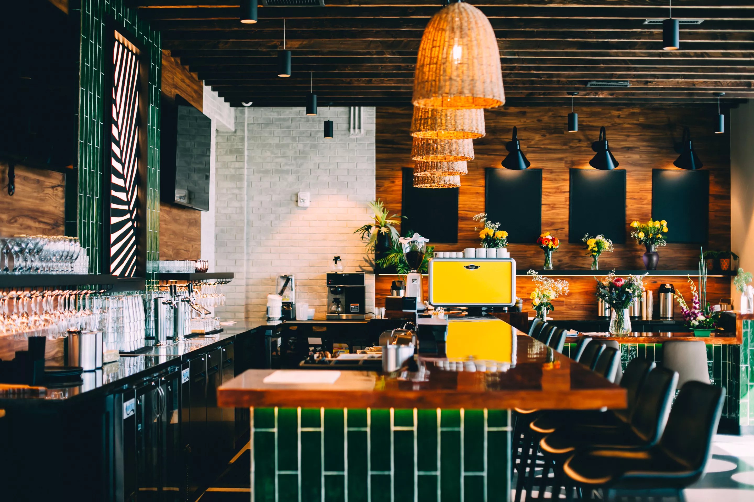 a bar with green tile