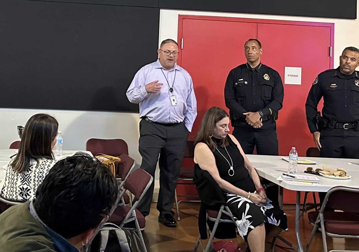 Denver law enforcement officials talk during public meeting