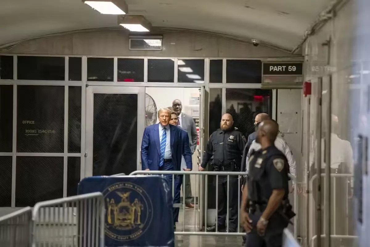 Donald Trump walks out of court