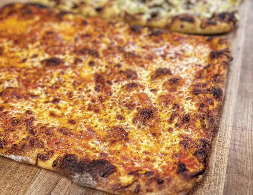 a rectangular cheese pizza