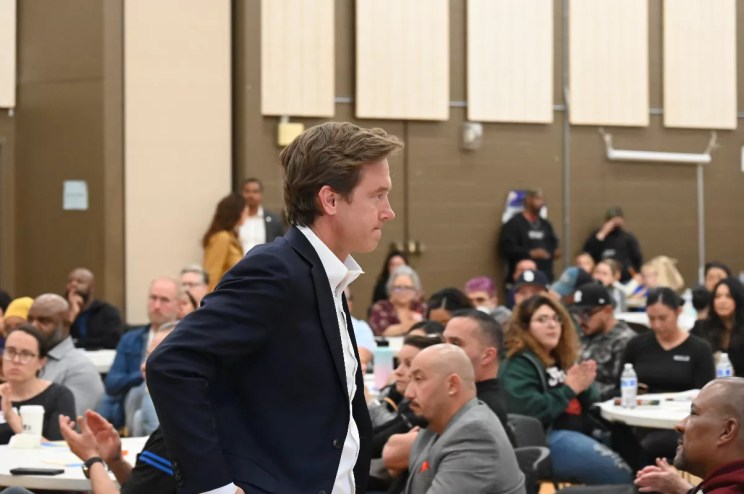 Mayor Mike Johnston talks to Denver residents.