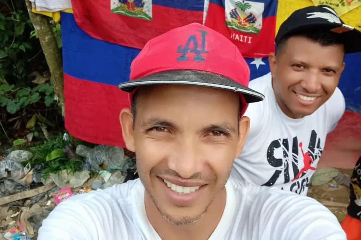 A migrant takes a selfie at the Panama-Colombia border.