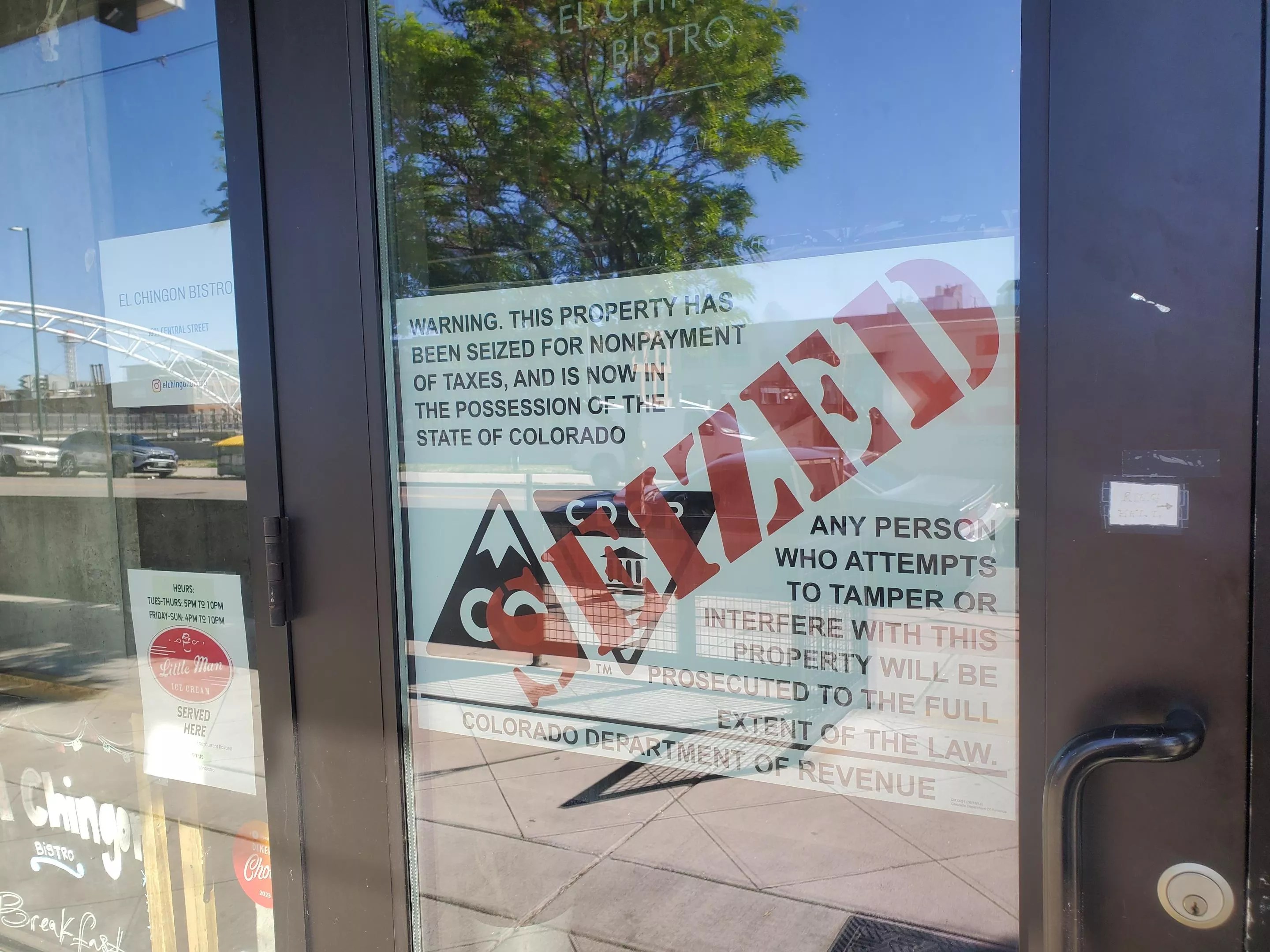 seizure notice on a glass door