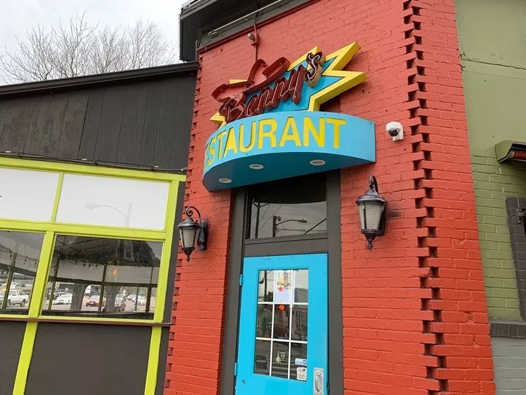 outside of mexican restaurant  that's red and teal