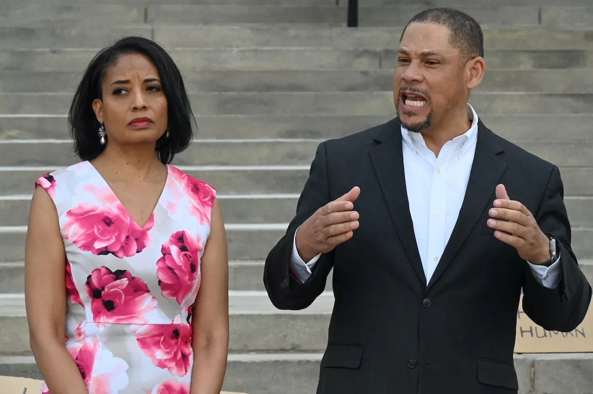 People talk at City Hall.