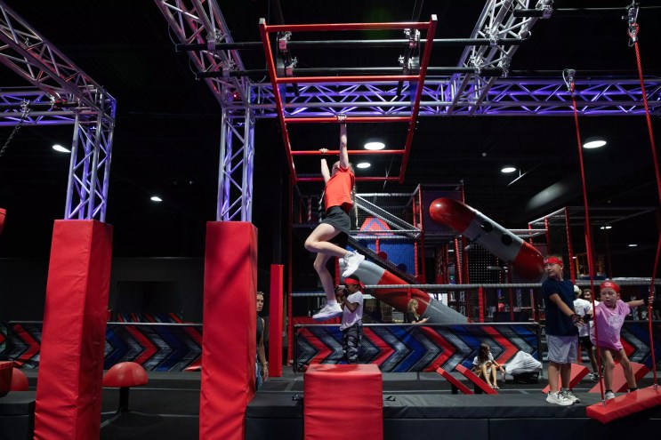 child in an obstacle course