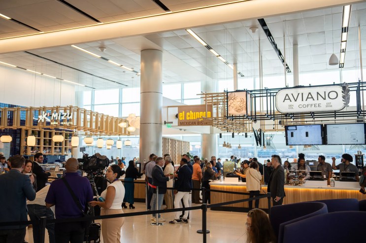 restaurant kiosks in a busy airport