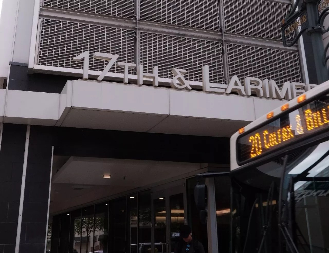 bus and sign outside building
