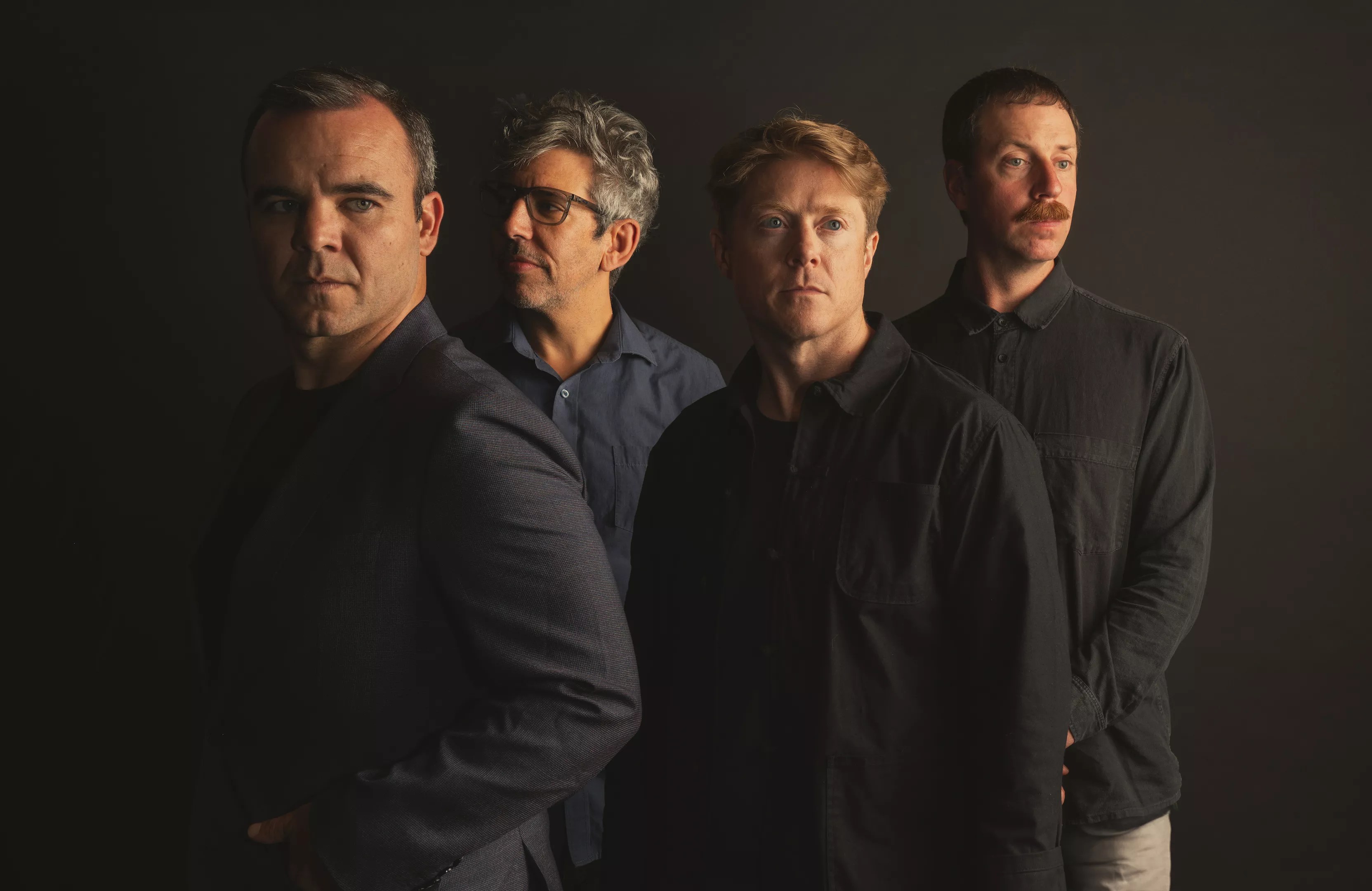 four members of band