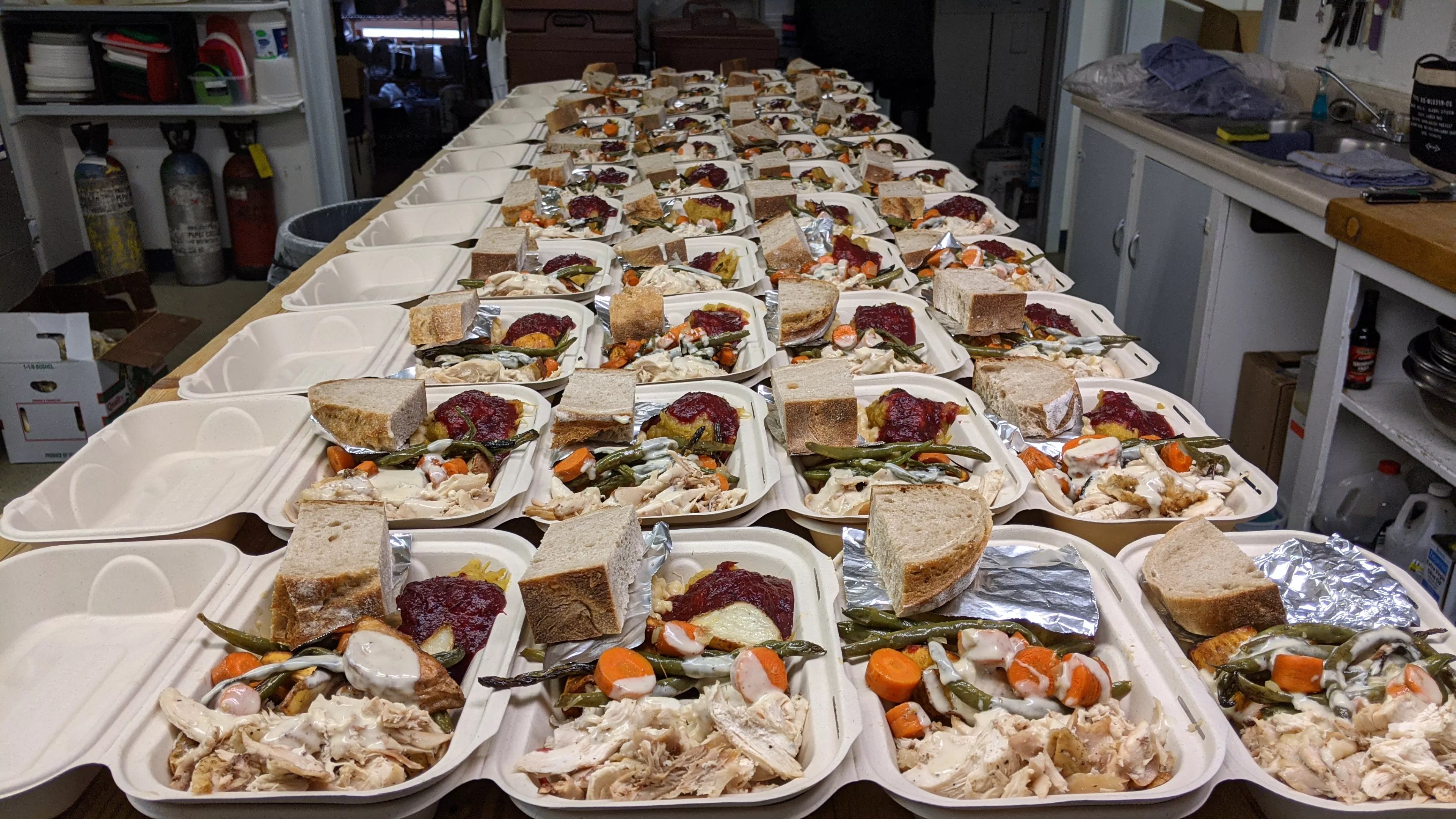 to-go meals lined up on a table