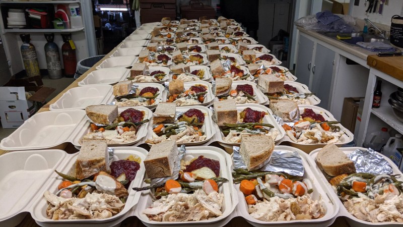 to-go meals lined up on a table