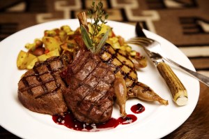 various grilled meats on a plate