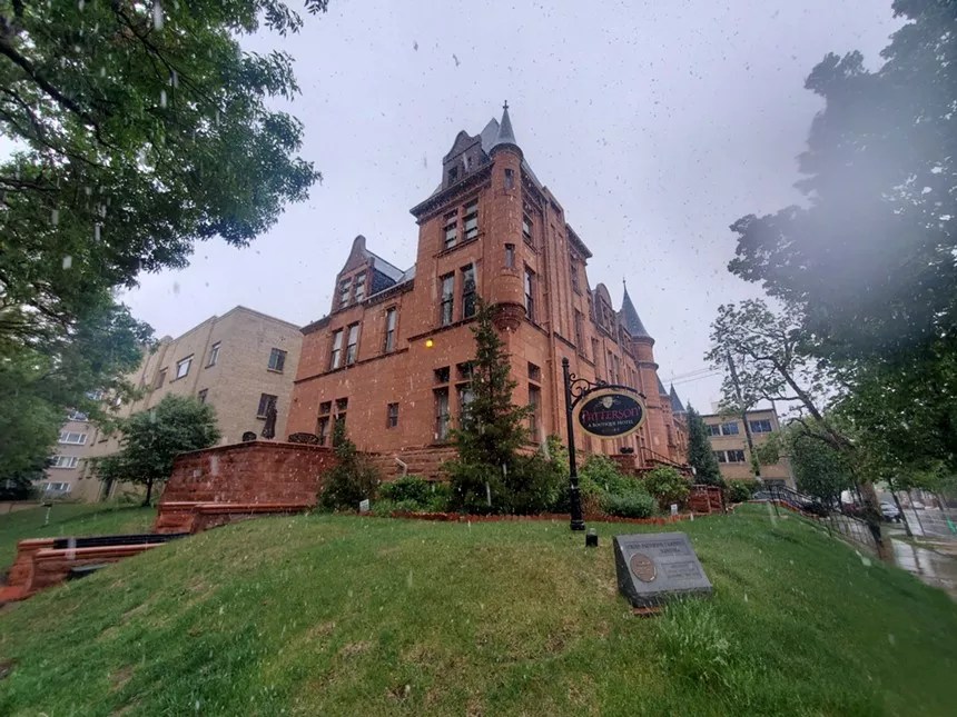 The red brick exterior of the Patterson Inn