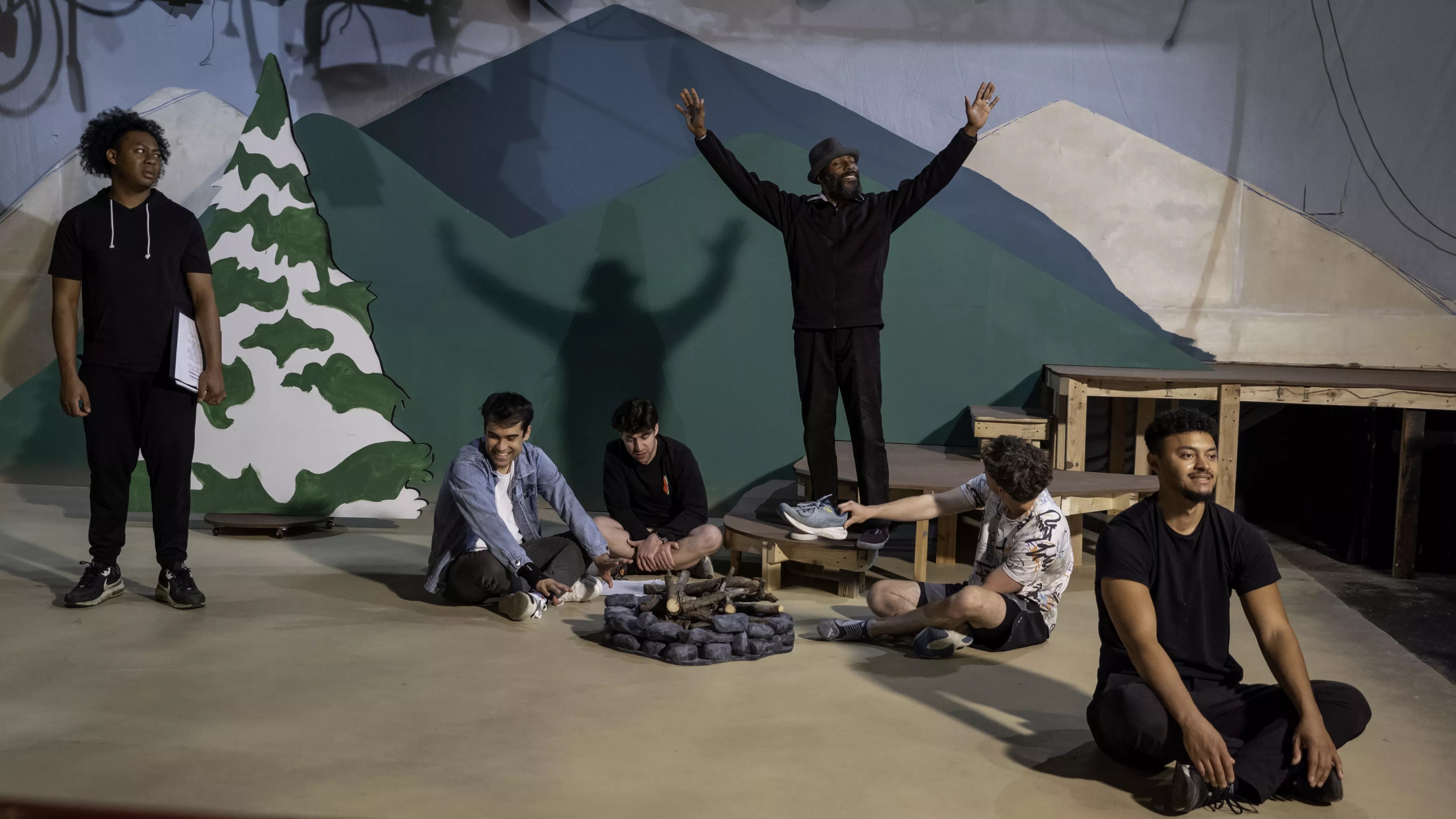 actors on set rehearsing Cannibal: The Musical