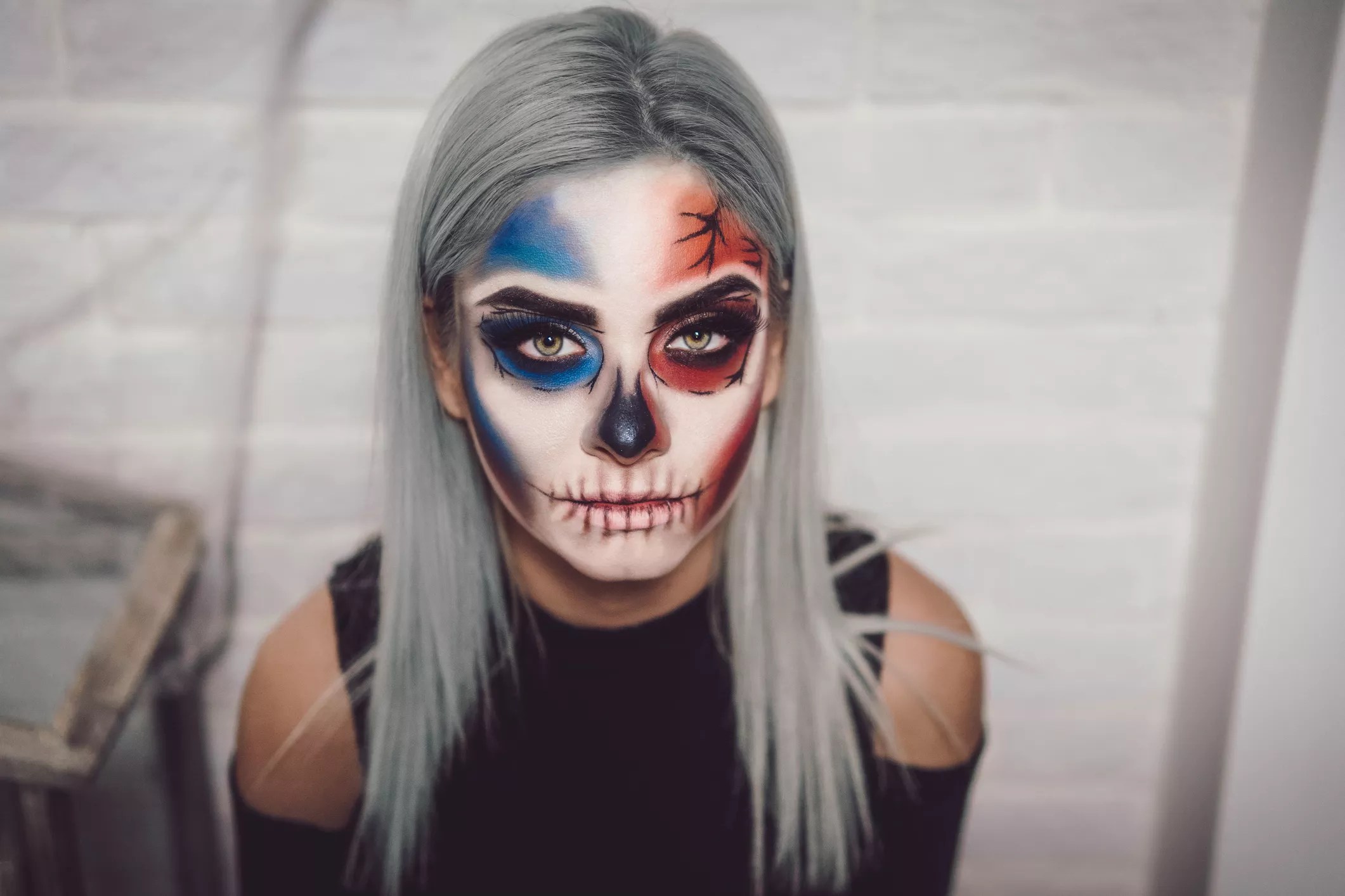 woman with painted face for halloween