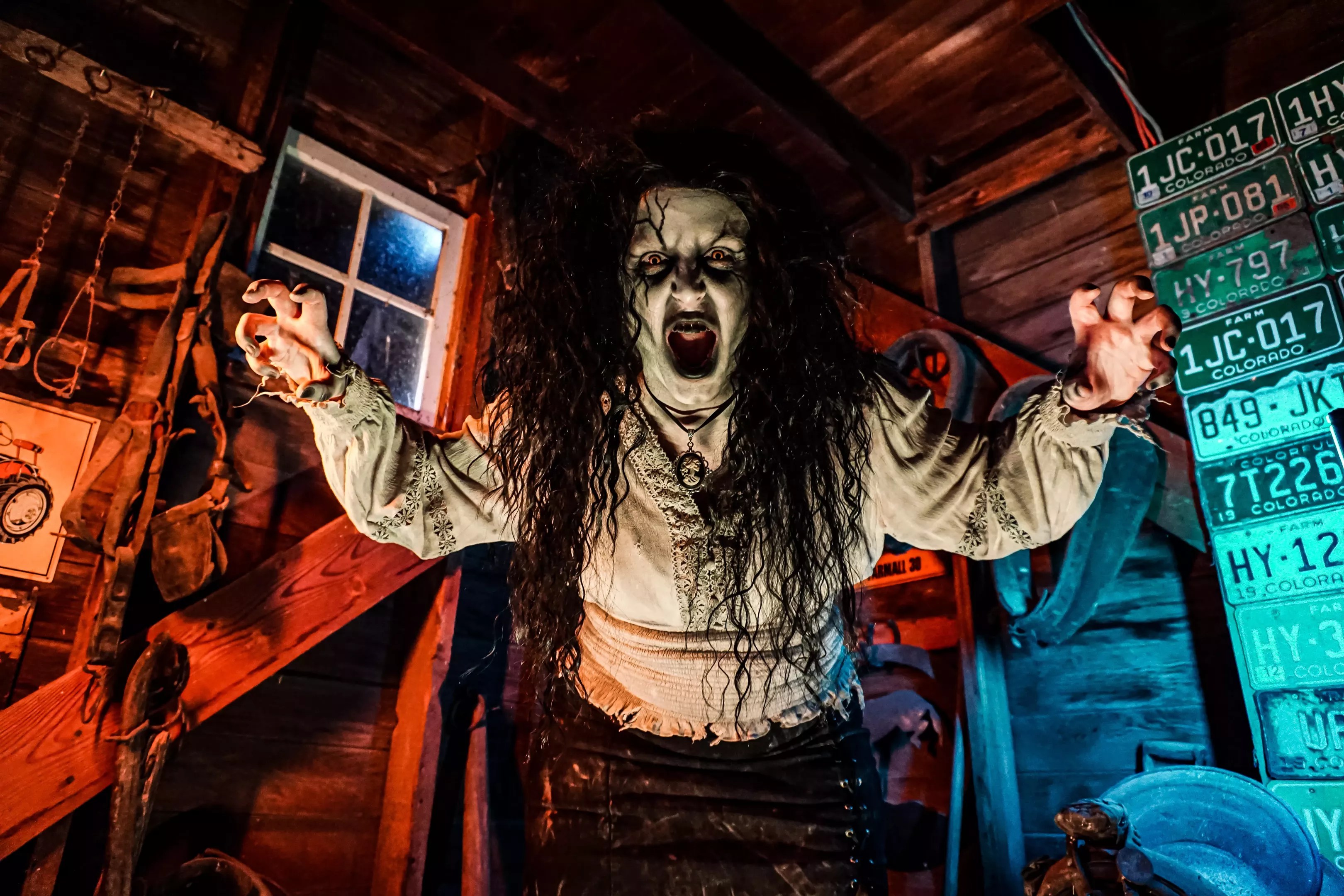 man in horror wrestling costume with arms out