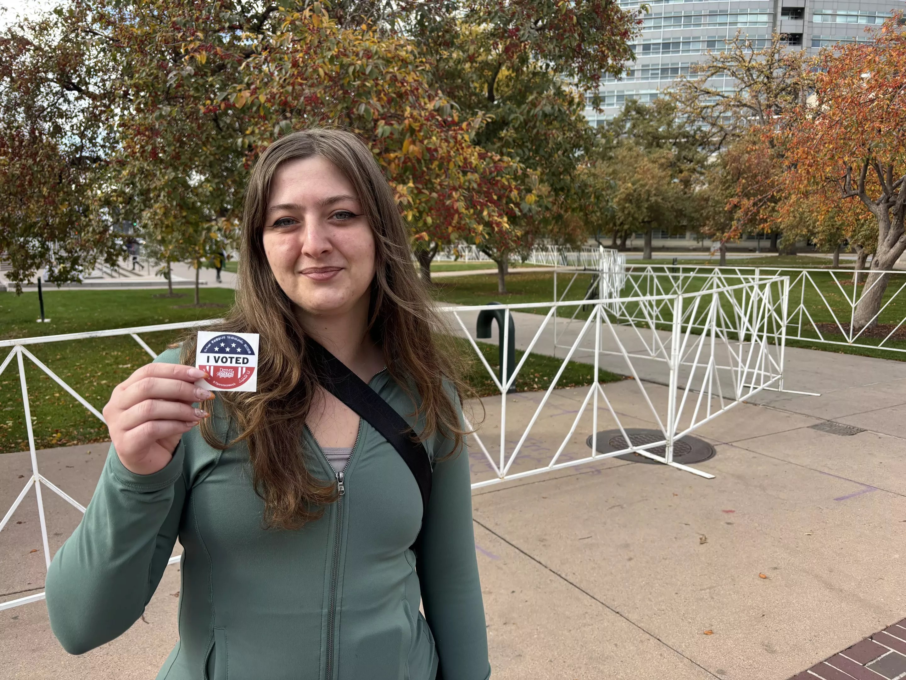 Young woman with "I voted" sticker