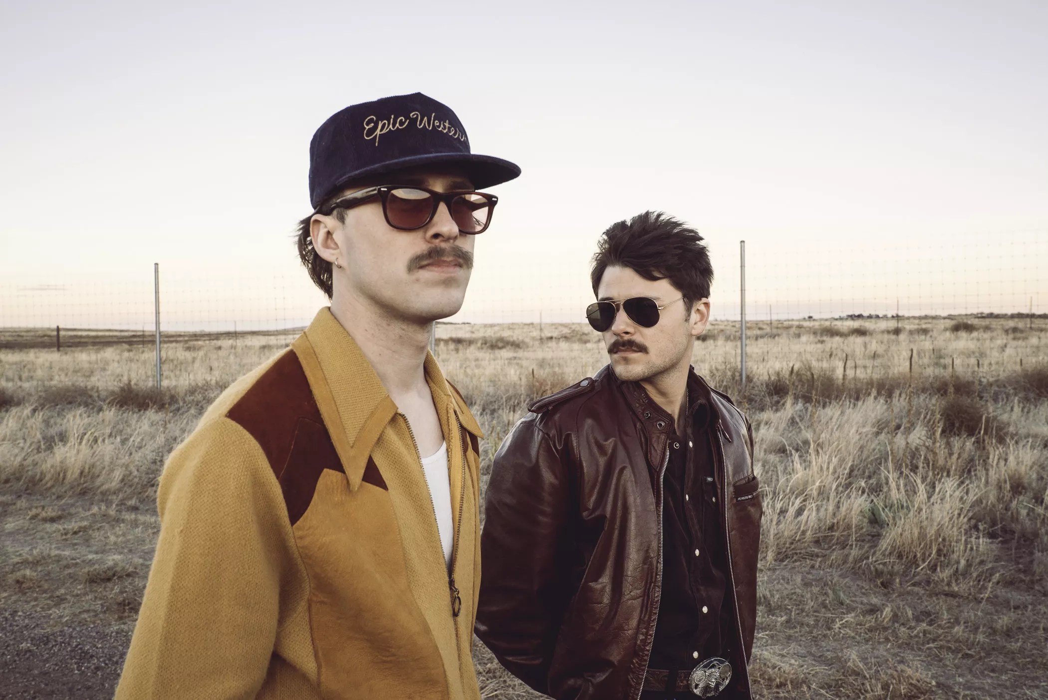 Kellen Wall and Bryce Menchaca of Marfa standing in a field