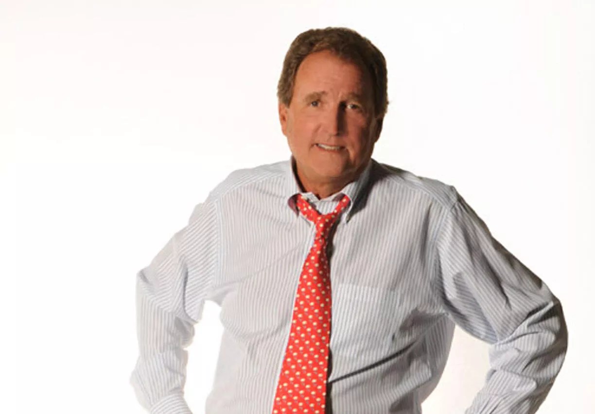 man in shirtsleeves and tie