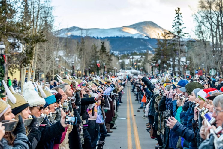 Drinkers participating in the Ullr Fest shotski event on Breckenridge's Main Street