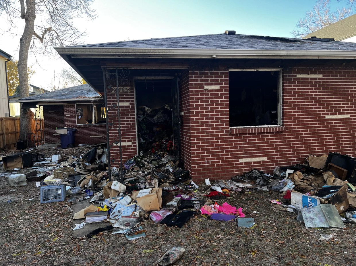 Home after fire with trash thrown around